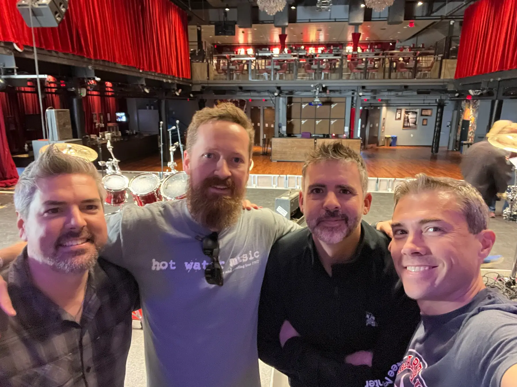 The Silent Critics together at a bar gig
