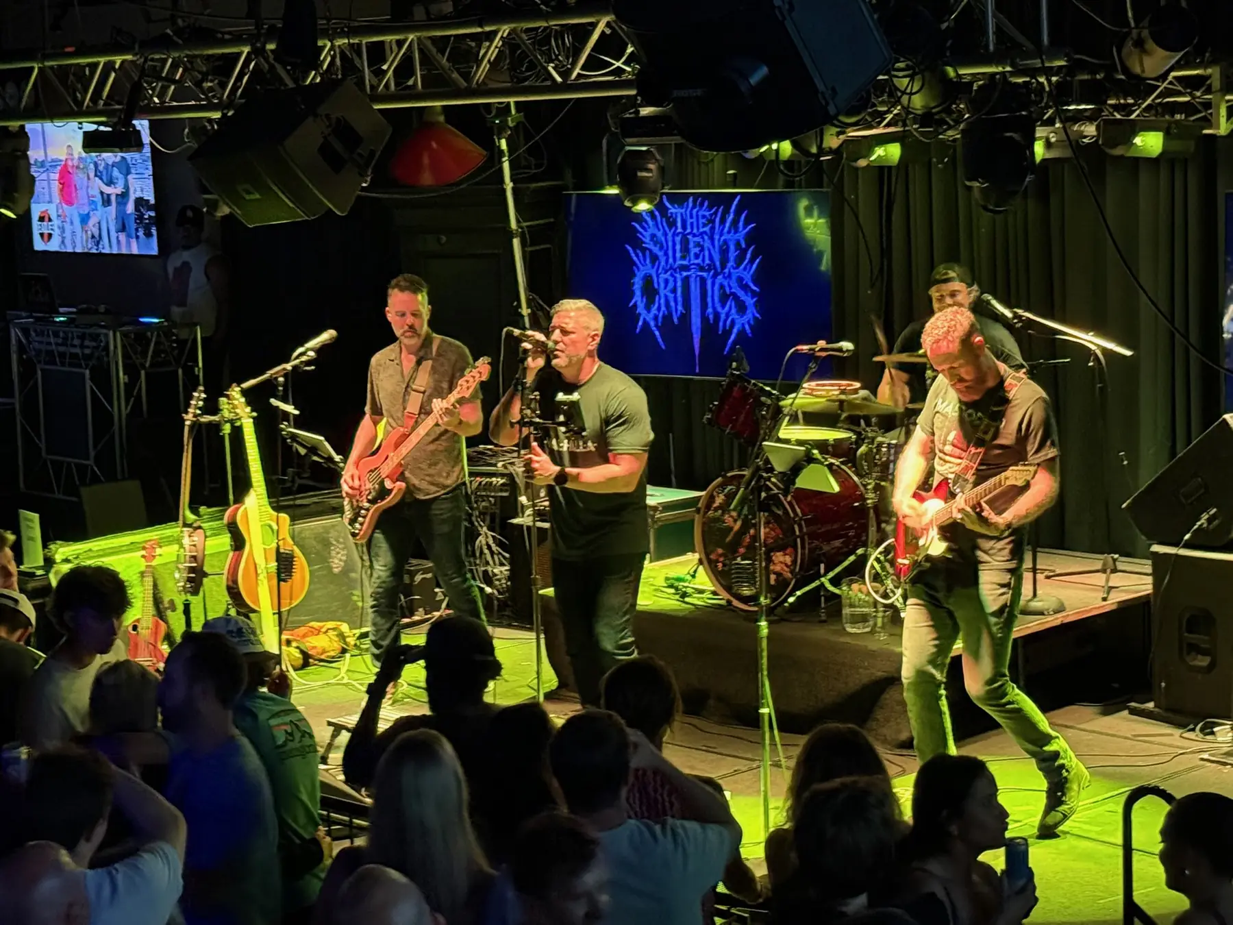 The band under green stage light